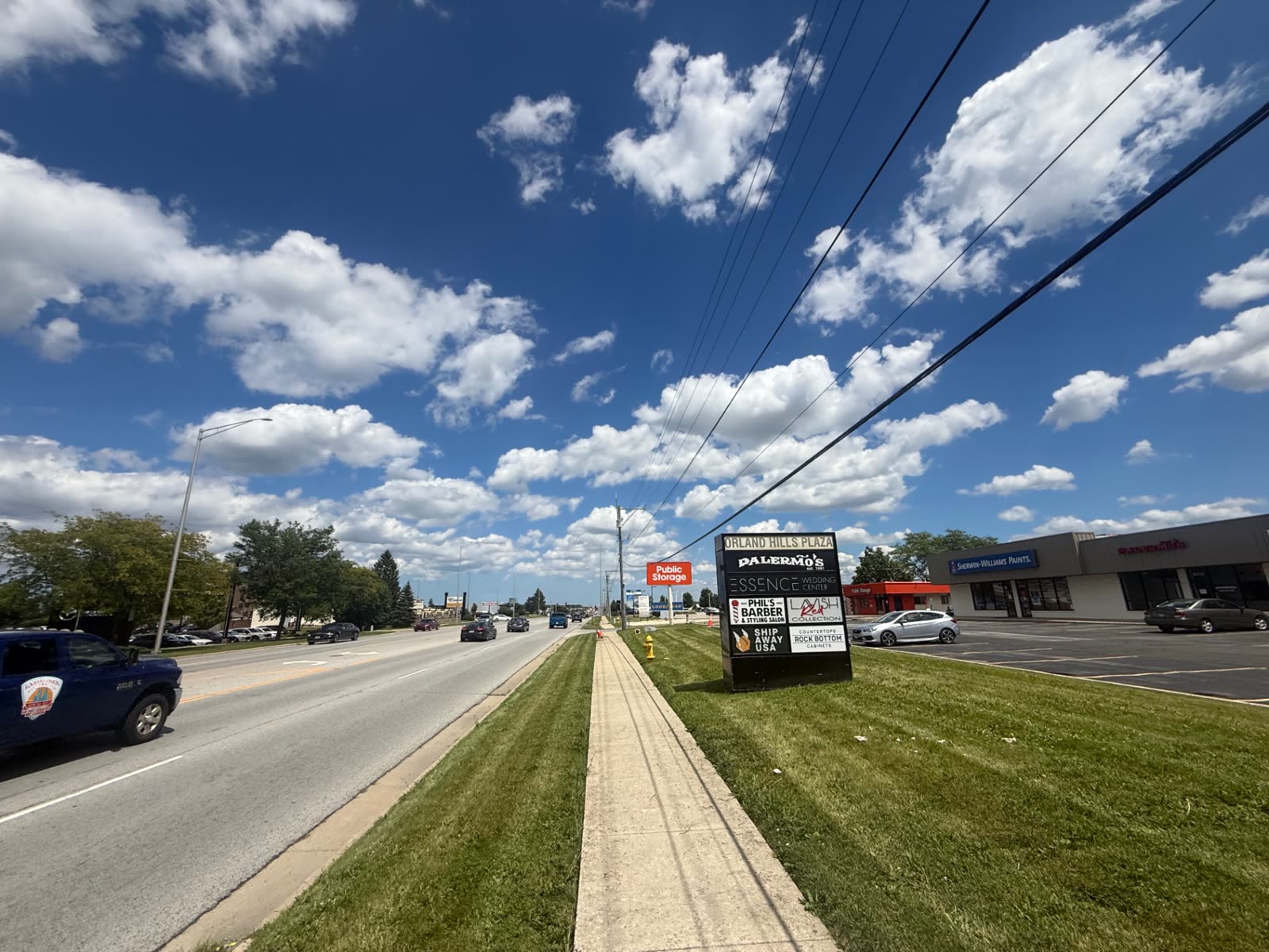 Mowed roadside turf at a commercial plaza