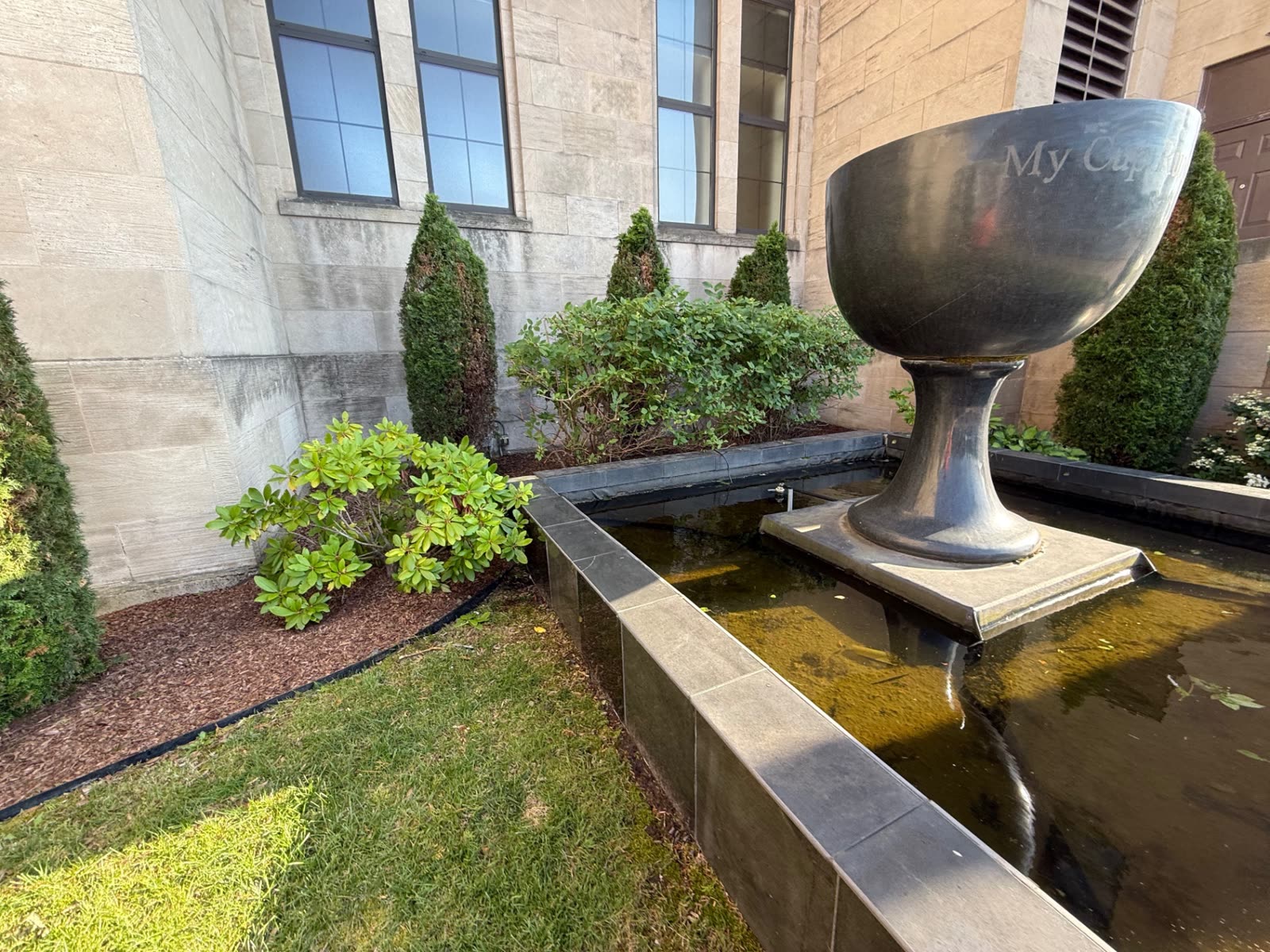 Fountain courtyard beds with clean edging