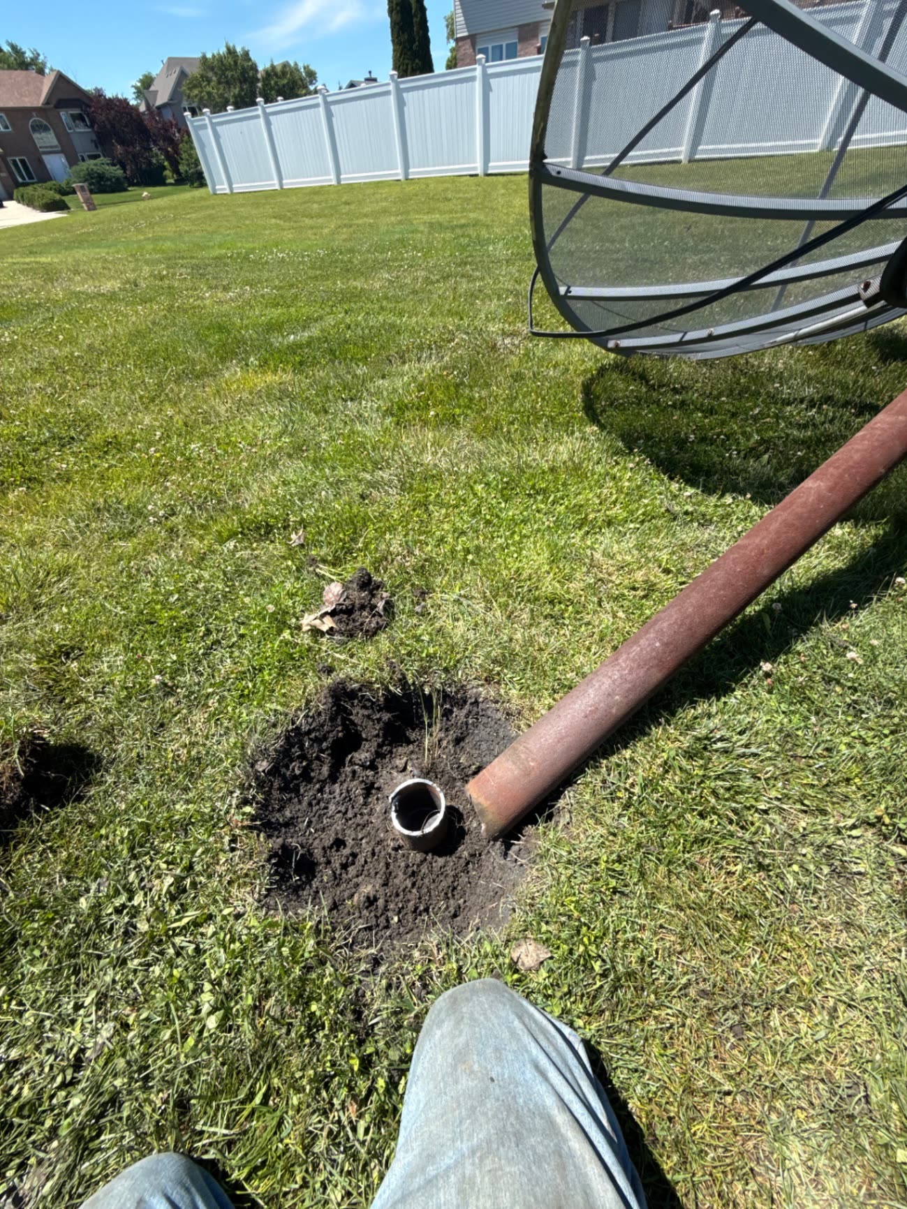 Satellite dish removal in a residential yard