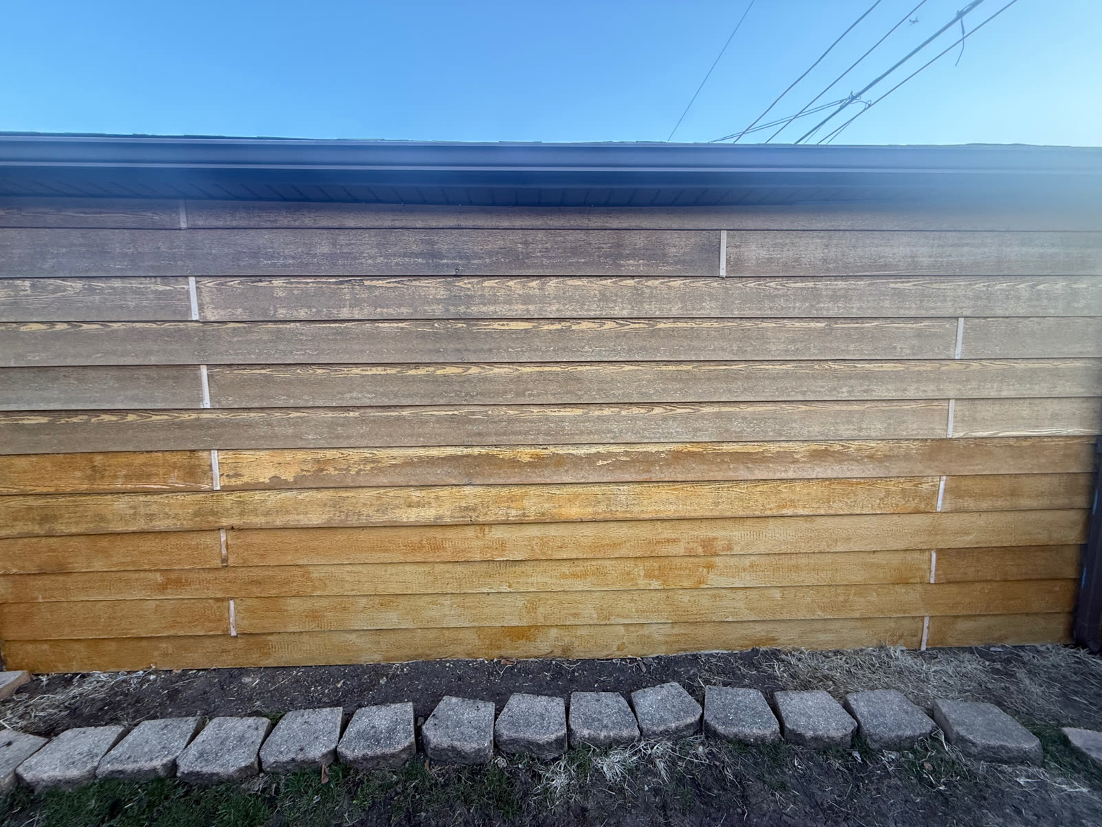 Weathered wood fence before staining