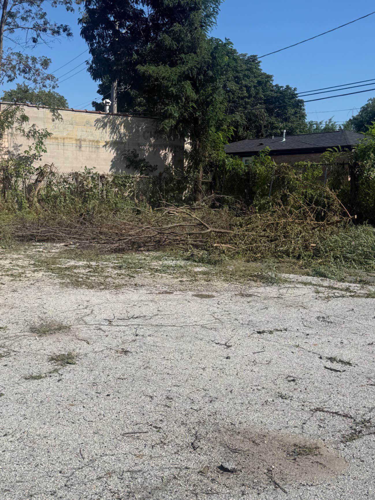 Cleared lot with debris loaded for haul-away