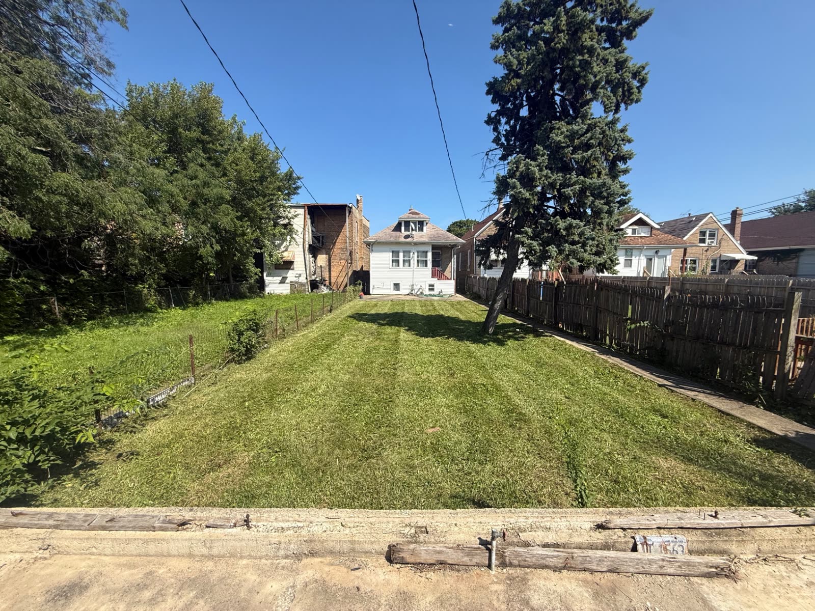Same backyard after cutting and cleanup